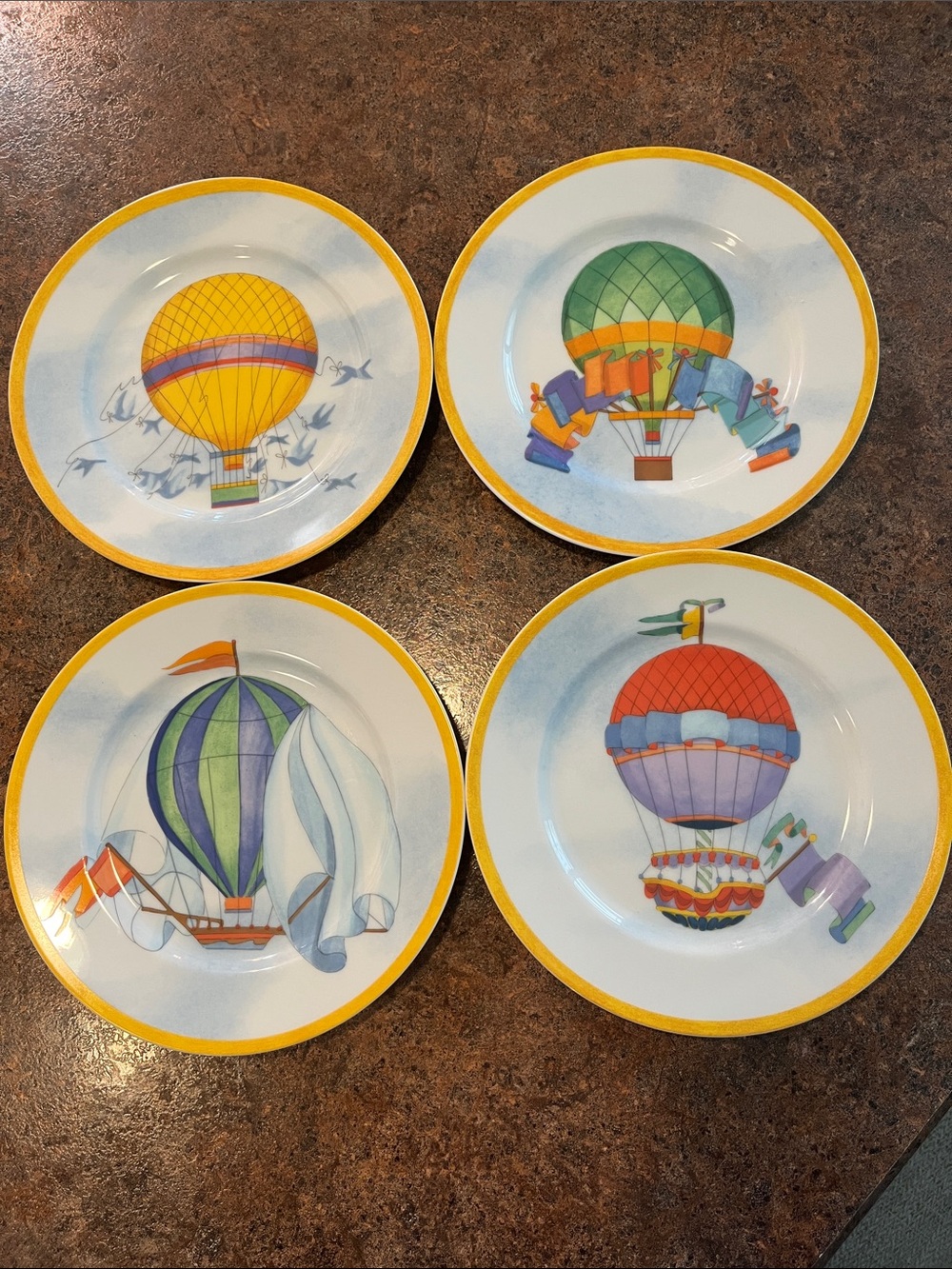 4 Williams Sonoma Montgolfiere porcelain Hot Air Balooon design salad plates 8”